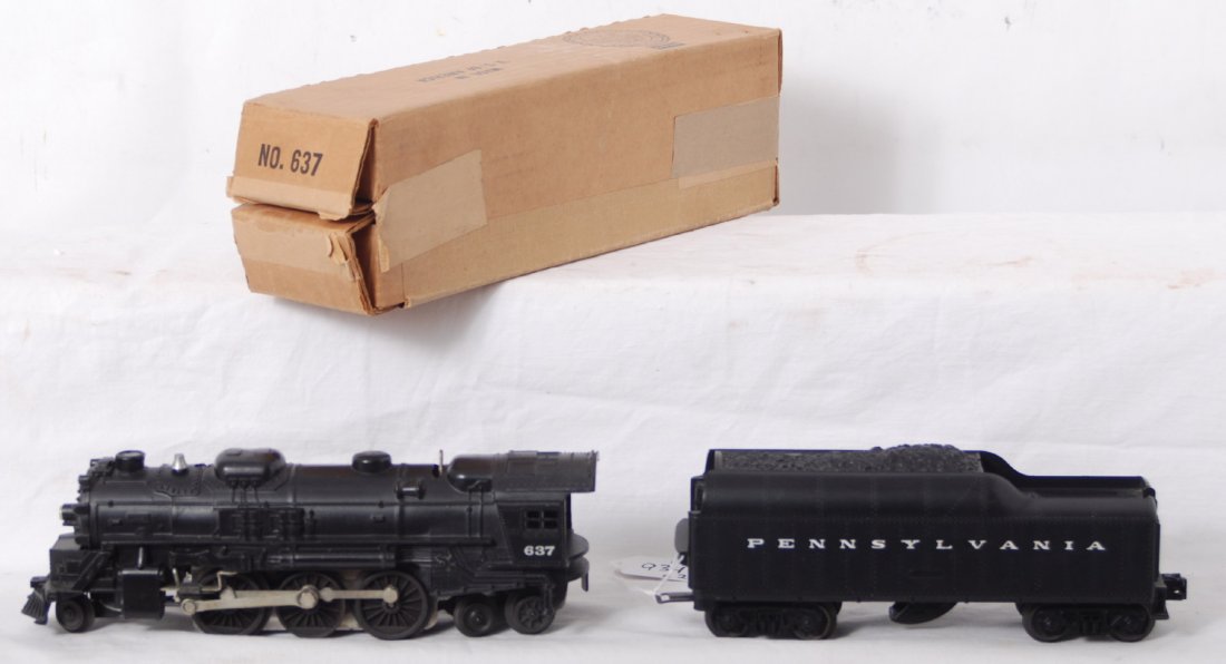 Lionel 637 steam loco and Pennsylvania whistle ten: Postwar Lionel O gauge 637 steam locomotive with unnumbered Pennsylvania whistle tender with touchup and some light rust on pickup rollers. Trains look C7 area. C8-9 loco OB included.