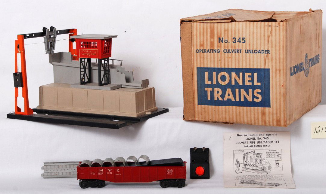 Lionel 345 operating culvert loader in original b: Postwar Lionel O gauge 345 operating culvert loader in original box with 6342 New York Central culvert car six culverts, 90 controller, connecting ramp, and reproduction instructions sheets. 6342 culv