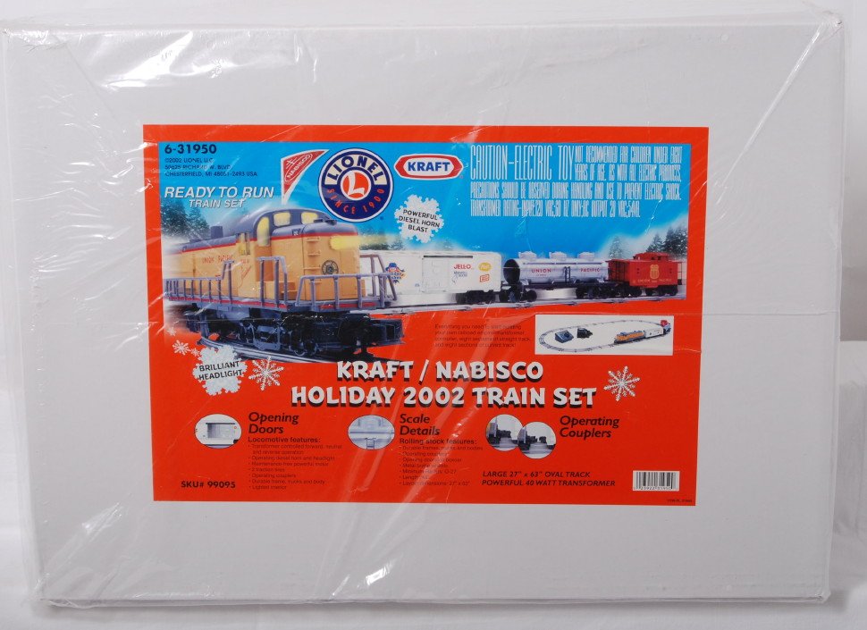 Lionel Kraft/ Nabisco 31950 holiday set: Lionel modern O gauge 31950 Kraft / Nabisco 2002 holiday train set in OB. Set is factory sealed C10.