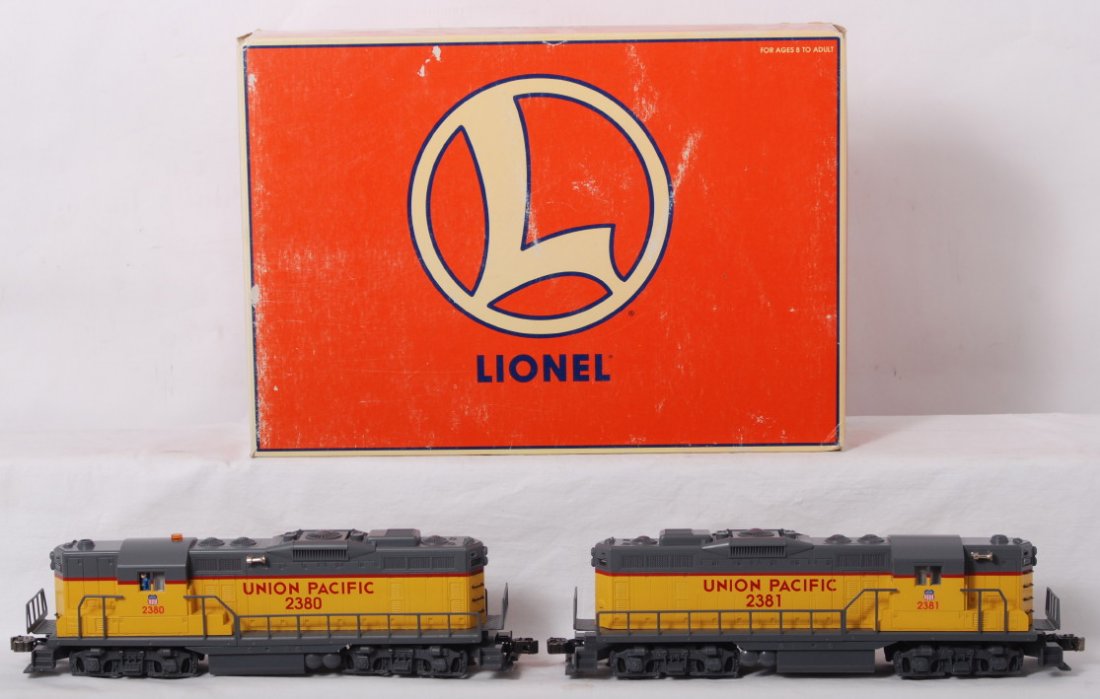 Lionel Union Pacific 11956 GP-9 lash up: Lionel modern O gauge Union Pacific 11956 GP9 lash up in OB. Loco features TMCC, Railsounds, Electrocouplers, and much more. Locos are C9-10. Shows light signs of a factory test run. Set box has some