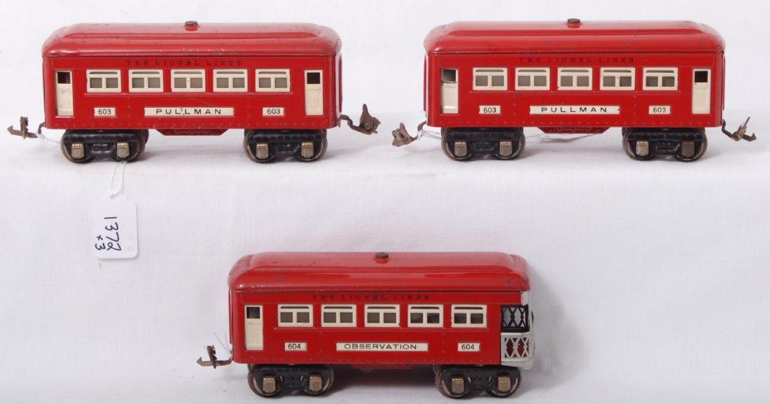 Lionel 603, 603, 604 red passenger cars: Prewar Lionel O gauge Red Comet passenger cars, two red 603 Pullman coaches and a red 604 observation. Trains should clean and polish C6 area.