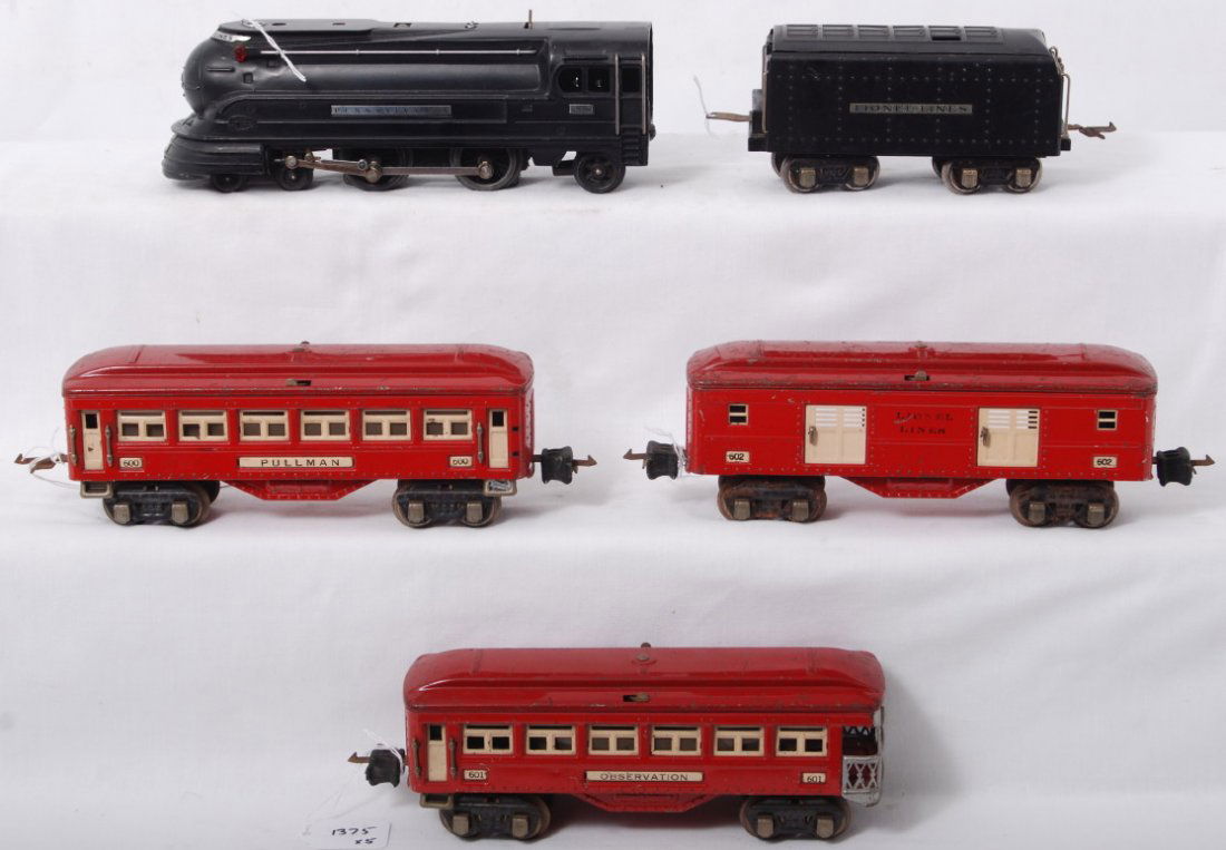 Lionel 238 Pennsylvania, 265W, 600, 601, 602: Prewar Lionel O gauge 238 Pennsylvania streamline steam locomotive and 265W whistle tender with 600 Pullman coach, 601 observation, and 602 baggage. 600 is missing a coupler box, passenger cars look C