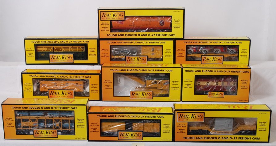10 railking freight cars 7109L, 79024, 74119, etc: MTH Railking modern O gauge freight cars in OB. Ten freight cars include 7109L Chicago and Northwestern stock car, 76122 Milwaukee Road flat with tow trucks, 7707L Chicago and Northwestern caboose, 79