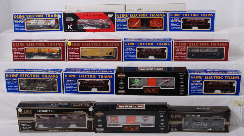 18 K Line and Railking cars Harley, Ford, Mobilgas,: K Line and Railking modern O Gauge freight cars in OBs. Eighteen cars include 639-105 True Value tank car, two 691-5301 Circus Transport flat cars, 632-8019 Mobilgas tank car, 5216 Milwaukee Road stoc