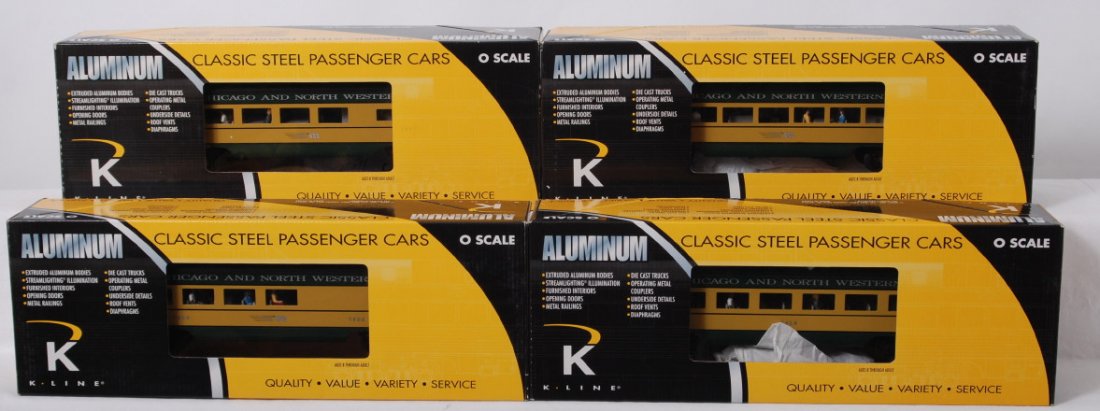 4 K Line C&NW aluminum 15Õ passenger cars: K Line modern O gauge Chicago and Northwestern aluminum fifteen inch passenger cars in OBs. Four cars include K4620-16950 diner, 17502 combine, 13419 coach, and 17200 observation. Cars are C8 with run