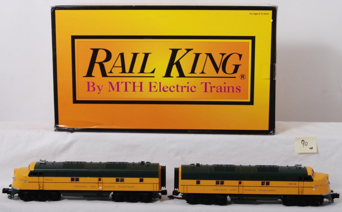 Railking Chicago and Northwestern E-8 A-A with Prot: MTH Railking modern O gauge 30-2343-1 Chicago and Northwestern E-8 A-A set in OB. Loco features Protosound 2.0, DCS control, Protosmoke, Protocoupler, and more. Locos are C8 with run time. OB has ligh