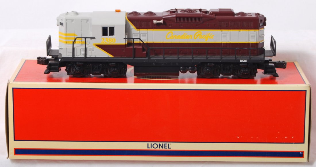 Lionel Canadian Pacific GP9 with TMCC 18564: Lionel modern O gauge Canadian Pacific GP-9 in OB. Catalog number is 18564. Loco features TMCC, Railsounds, directional lighting and more. Loco is C8 condition with some run time. OB has some corner w