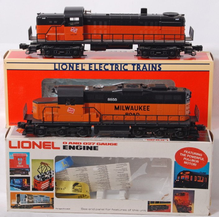 Lionel Milwaukee Road SD18 and RS3: Lionel modern O gauge diesel locomotives in OBs. Includes 18833 Milwaukee Road RS-3 and 8855 SD-18. Locos are C7-8 with run time. OBs have some light wear. Some very light rust spots on SD18 frame.