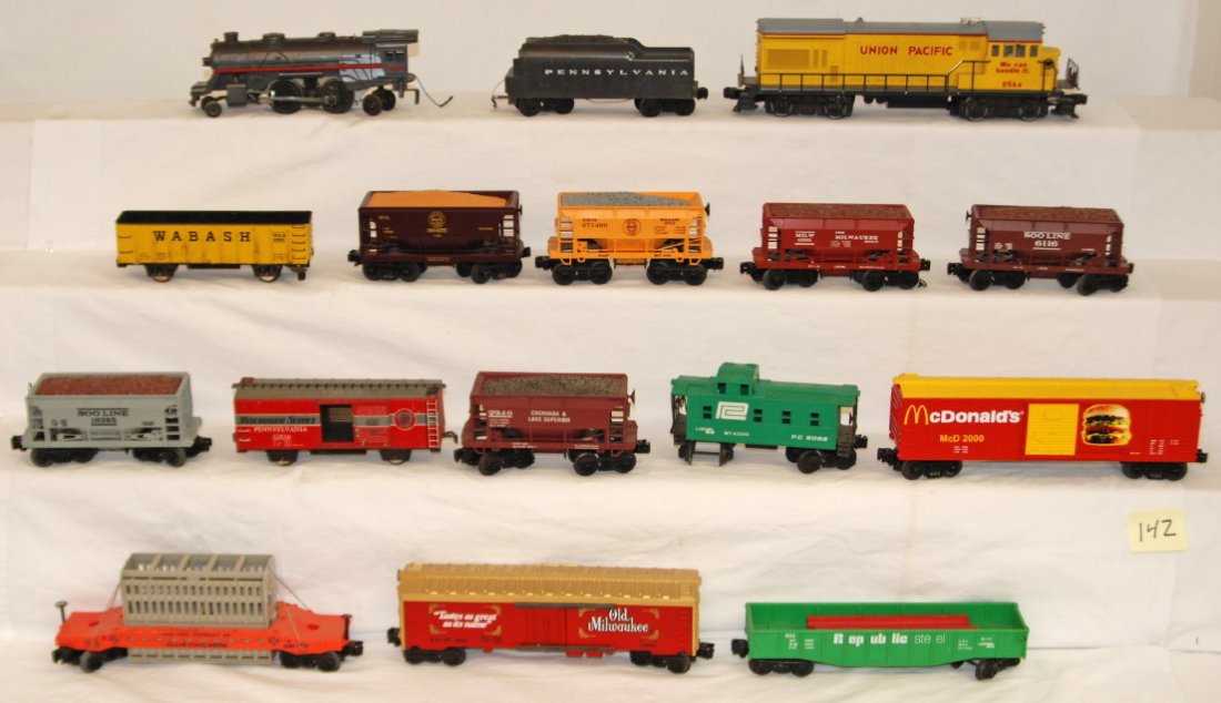 Mix lot of O gauge cars and locos: Mixed lot of O gauge freight cars and locos. Includes McDonalds boxcar, 9142 Republic gondola, modern 9232 Allis Chalmers condenser car, 9856 Old Milwaukee reefer, 6116 Soo Line ore car, 19301 Milwauk