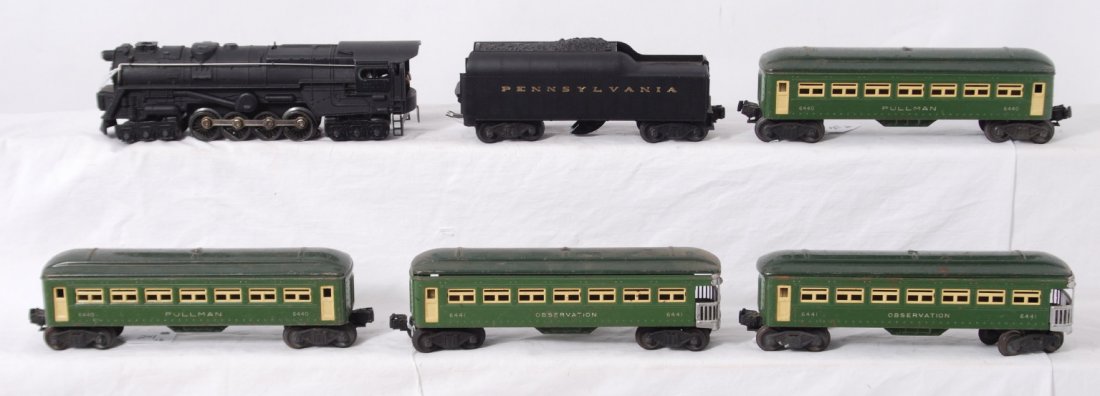 Lionel 2020, 2046W, 6440, 6440, 6441, 6441: Postwar Lionel O gauge 2020 steam locomotive and 2046W Pennsylvania whistle tender with two 6440 Pullman coaches, and 6441 observation passenger cars. Trains have repainting, repro shell, missing roof