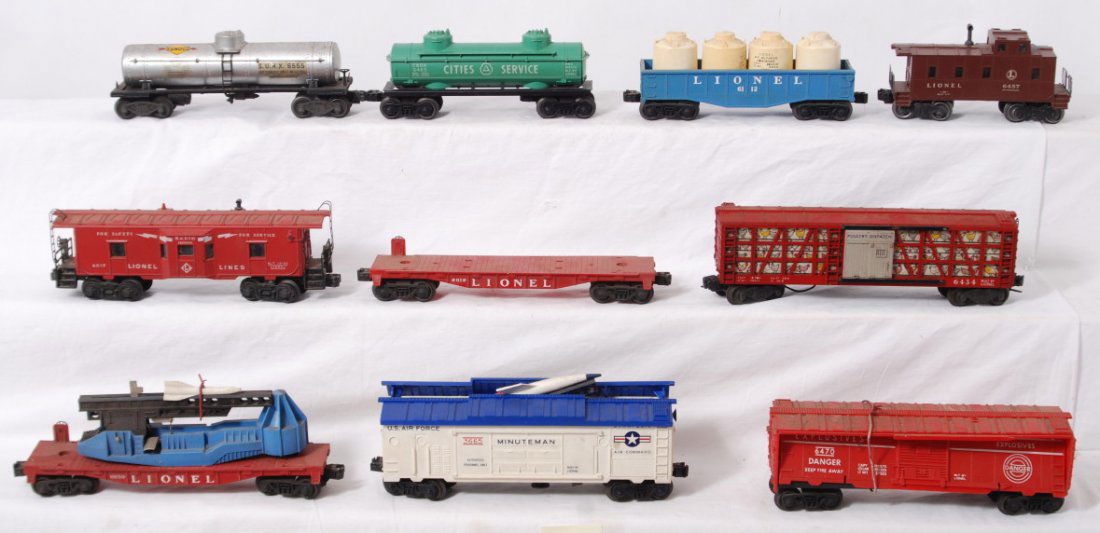 Lionel freight cars, 6470, 6819, 6434, 6650, 3665,: Postwar Lionel O gauge freight cars, dirt, missing roof end, rust, etc. Cars range from Òas isÓ to C6. 6470, 6819, 6434, 6650, 3665, 6517, 6555, 6465, 6112, and 6457.