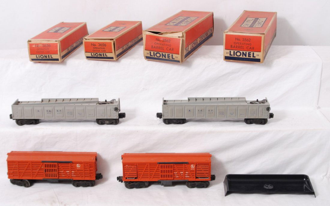 Lionel 3656, 3562-25, 3656, 3562-25 in OB: Postwar Lionel O gauge freight cars in original boxes, C6. Two 3656 operating cattle cars and two 3562-25 A.T.S.F. barrel cars, in original boxes. Boxes are square and solid with wear to flaps. one 16