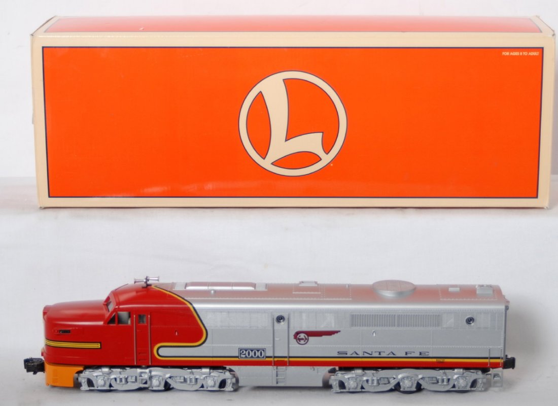 Lionel Santa Fe Alco PA 18952: Lionel modern O gauge 18952 Santa Fe Alco PA diesel locomotive in OB. Loco features TMCC and Signal Sounds. Loco is C8 condition with run time, however has incorrect orange pilot. OB has some wear on 