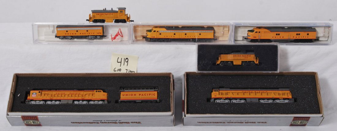 7 N scale Union Pacific locomotive: Modern N scale Union Pacific locomotives from various manufactures. Seven locos include Con Cor 001-322102 gas turbine, 001-003301 U-50, dummy F3 B unit, Life Like 7172 and 7012 E8 and E7, Con Cor 000