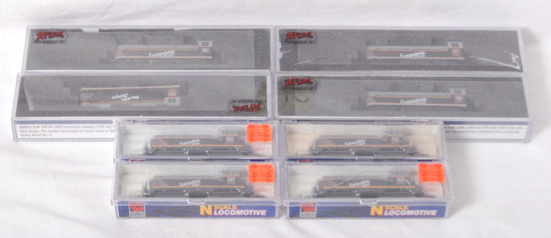 8 Burlington N scale switchers Atlas Life Like: Modern N scale Burlington diesel locomotive switchers in OBs. Eight locos total. Four Atlas locos include 51007, 51008, 51018, and 51019 VO-1000 locos. Four Life Like locos include 7883 and three 7884