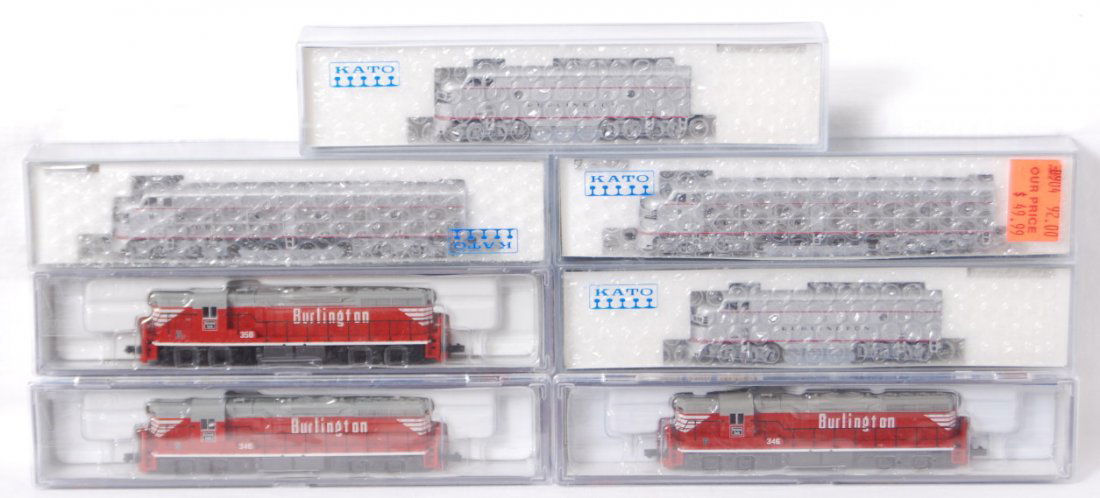 7 Kato and Life Like Burlington diesel locomotives: Kato and Life Like modern N scale Burlington diesel locomotives in OBs. Seven locos include Kato two 176-5101 E8/9 locos, 176-1311 and 1312 F3 A units and Life Like two 7745 and 7770 SD7 locos. C9-10
