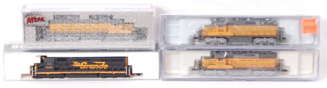 4 Kato, Atlas and Life Like diesel locomotives: Modern N scale diesel locomotives from Kato, Atlas, and Life Like. Includes Kato Rio Grande SD45 in incorrect box, 7250 Union Pacific GP20, 7809 Union Pacific GP20, and 54414 Union Pacific SD-24. Loco