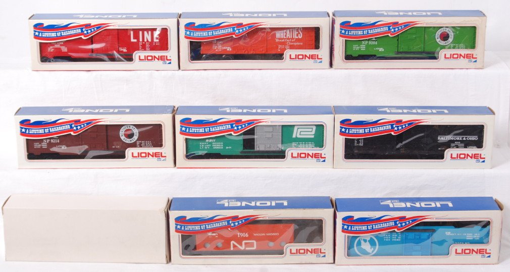 Nine Lionel O gauge freight cars in OB: Modern era Lionel O gauge freight cars in original boxes that may or may not match the cars inside, unrun C8-10. A couple cars have spots of light surface rust at door guide rivets. Boxes show little 