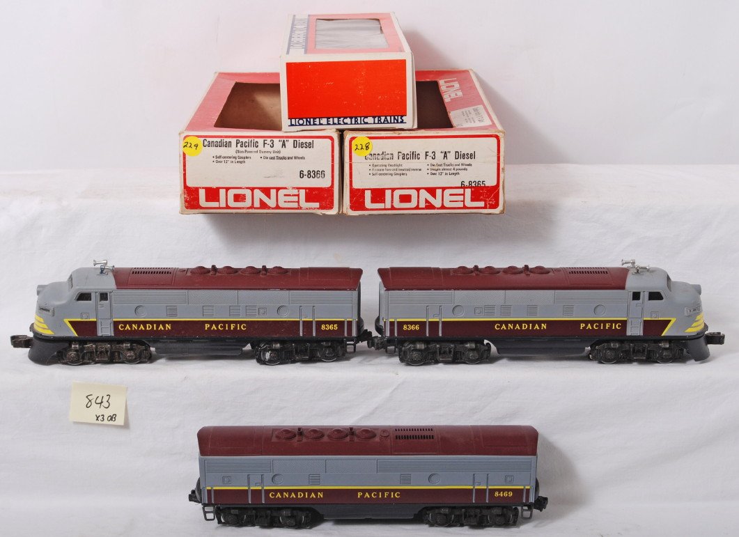 Lionel Canadian Pacific F3 A-B-A 8365, 8366, 8469: Lionel modern O gauge Canadian Pacific F3 A-B-A diesel locos in OBs. Unit are 8365 powered, 8469 B Unit in incorrect box, and 8366 dummy. Locos are C7 condition with some run time and some discolorati