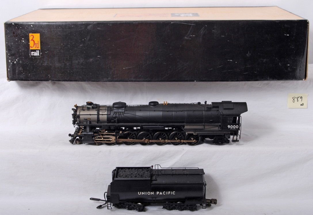 3rd Rail Union Pacific 4-12-2 steam locomotive: 3rd Rail brass modern O gauge Union Pacific 4-12-2 steam locomotive in OB. Loco features smoke, electronic reverse, sound and more. Loco is C8 with run time. OB has some light wear.