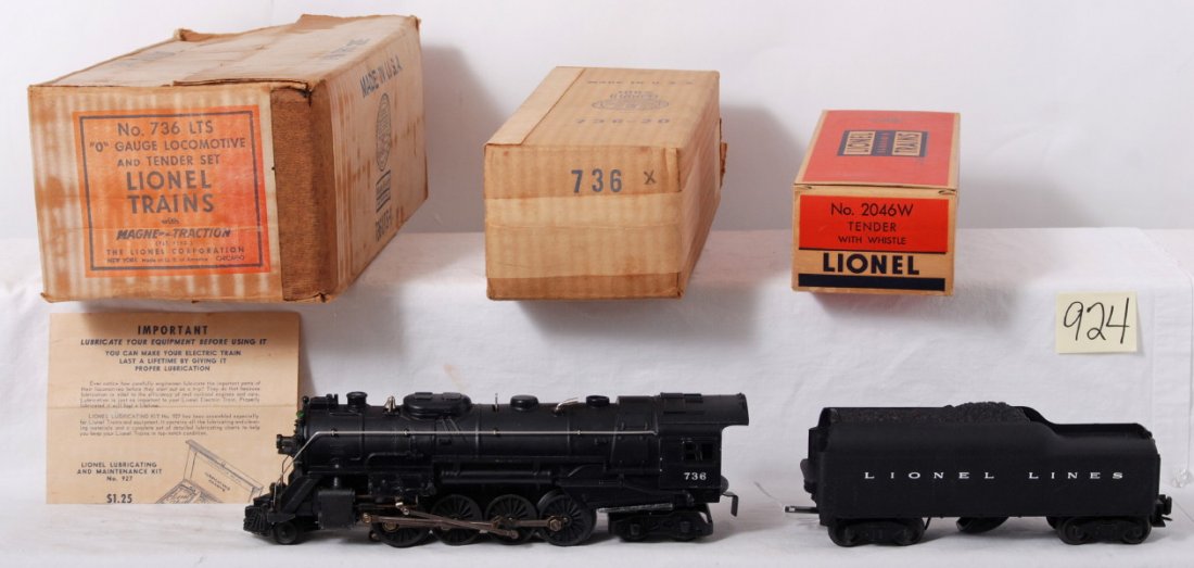 Lionel 736 steam locomotive and tender in OB: Postwar Lionel O gauge 736 steam locomotive and 2046W tender with whistle in original master carton and inner boxes. Tender has super tight hairline below screw, otherwise trains are very clean C7. In