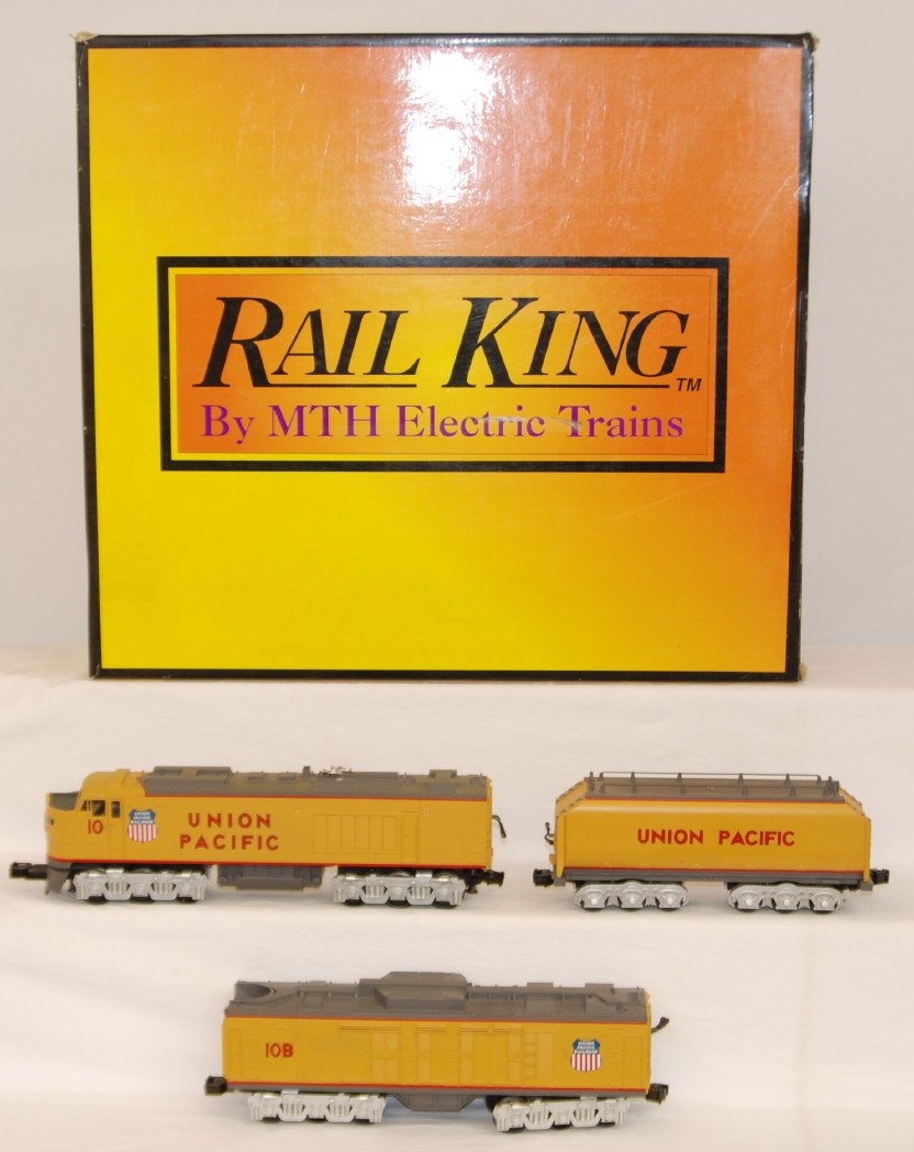 Railking Union Pacific gas turbine with Proto 2: MTH Railking modern O gauge 30-2009LP Union Pacific gas turbine in OB. This set has been upgraded to Protosound 2.0 with Protocouplers and DCS control. Set is C7-8 with run time. Some light marks on b