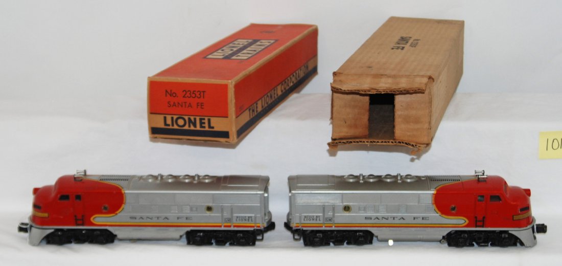 Lionel 2353P and 2353T Santa Fe F3 in OB: Postwar Lionel O gauge 2353P and 2353T Santa Fe F3a diesel locomotives in original boxes with insert in T box. Trains look nicer C6-7, trucks have been painted black. Battery compartment is perfectly
