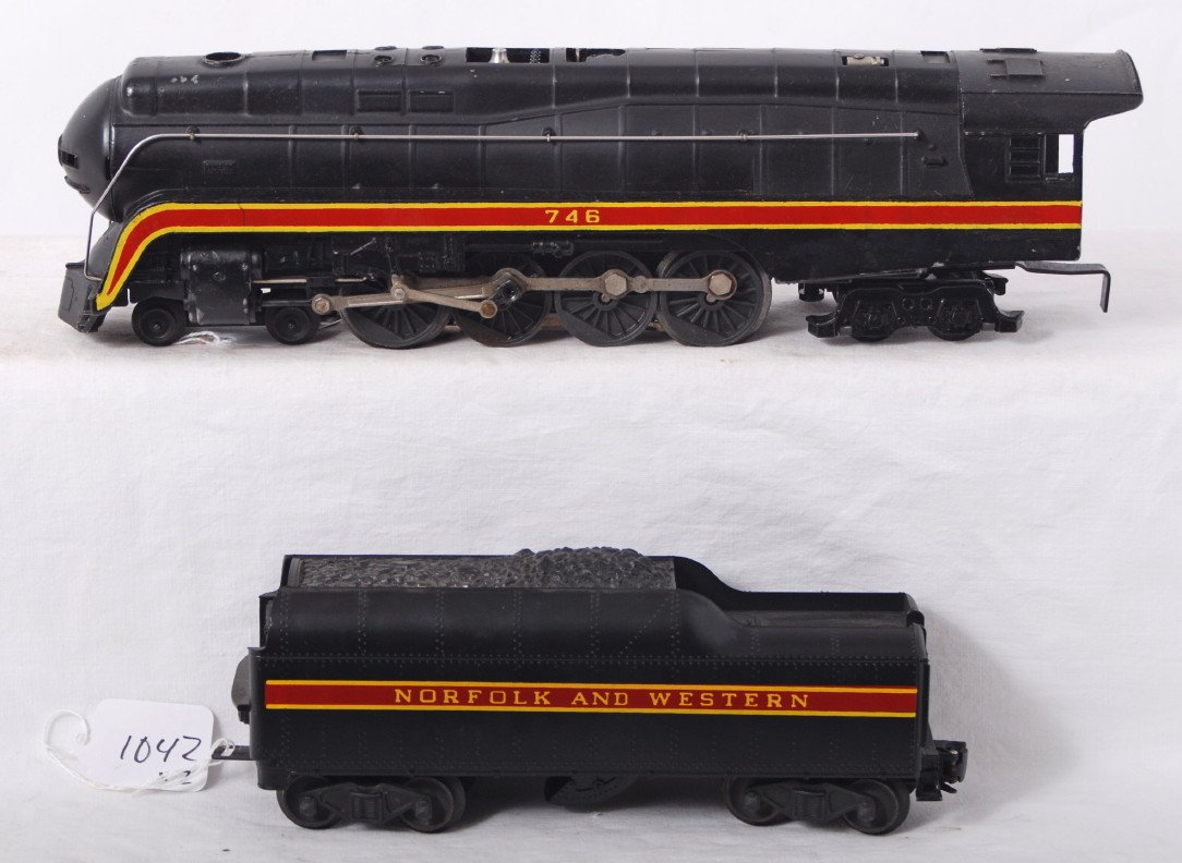 Lionel 746 N&W J w/tender: Postwar Lionel O gauge 746 N&W J class steam locomotive and 746W tender w/whistle. Loco has bent cab roof, C5-6. Tender looks C7.