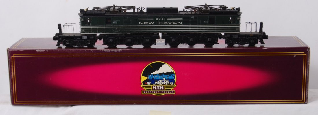 MTH New Haven EP-3 with Proto 2: MTH modern O gauge New Haven 20-5558-1 EP-3 electric locomotive in OB. Loco features Protosound 2.0, DCS control, Protocouplers, and more. Loco is C8 with run time.