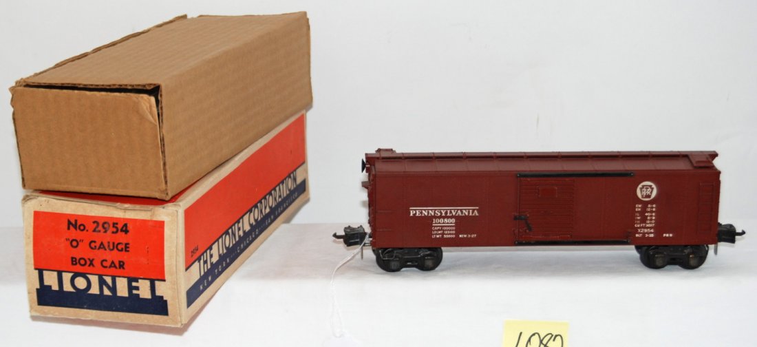 Lionel 2954 Pennsylvania boxcar in OB w/insert...: Prewar Lionel O gauge 2954 Pennsylvania boxcar in original box with insert, cellophane, and coupler protection tubes/rings, C7 with touchup to roof corner. Box is very clean and bright C7.