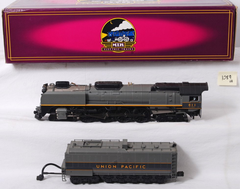 MTH Union Pacific FEF Northern with Proto 2: MTH modern O gauge 20-3078-1 Union Pacific FEF greyhound Northern steam locomotive in OB. Loco features Protosound 2.0, DCS control, Protosmoke, Protocoupler, and more. Loco is C8 with run time.