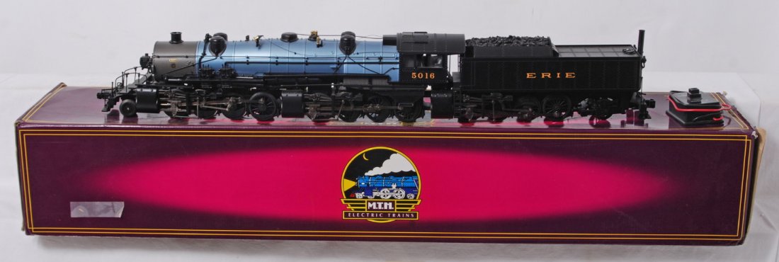 MTH Erie Triplex with Proto 2: MTH modern O gauge 20-3069-1 Erie 2-8-8-8-2 Triplex steam locomotive in OB. Loco features Protosound 2.0, DCS control, Protosmoke, Protocoupler, and more. Loco is C8 with run time. OB has wear at edge