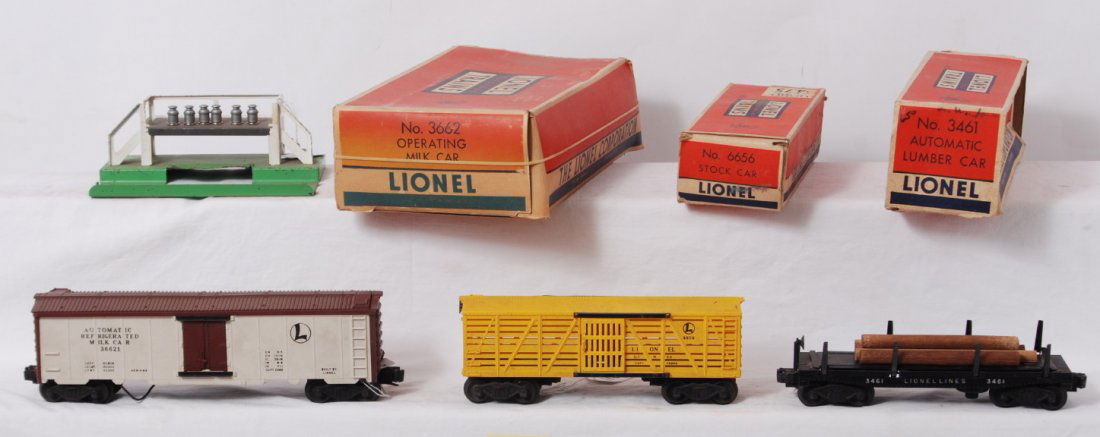 Lionel 3461, 6656, and 3662 in OB: Postwar Lionel O gauge 3461 automatic lumber car, 6656 stock car, and 3662 operating milk car with 3462P platform, in original boxes, C6-7. Boxes have some missing flaps. Six original milk cans and on