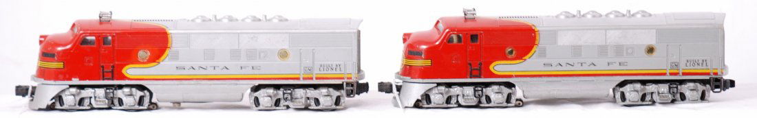 Lionel 2353 Santa Fe F3a diesel locomotives: Postwar Lionel O gauge 2353 Santa Fe F3a diesel locomotives with repainting to roofs, ends, chassis, and touchups. Trains otherwise look C6.