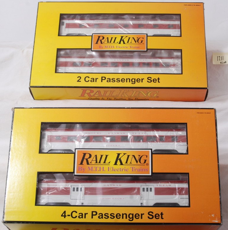 Railking MKT six car passenger set: MTH Railking modern O gauge MKT six car passenger set in OB. Includes 30-6774 four car set and 6775 two car sleeper / diner add on. Larger set box has some water damage and skinning. Cars are C8 with 