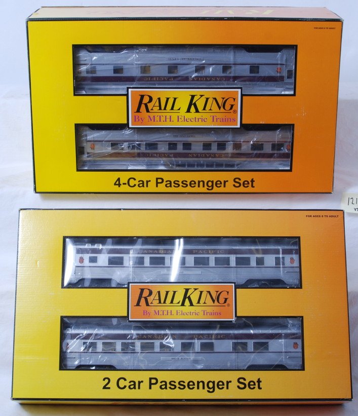 Railking Canadian Pacific six car passenger set: MTH Railking modern O gauge Canadian Pacific six car passenger set in OB. Includes 30-67228 four car set and 67229 two car sleeper / diner add on. Cars are C8 with run time. Set boxes have some light 