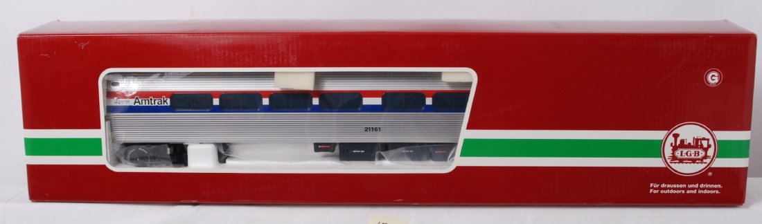 LGB 30220 Amtrak 21161 passenger car in OB: Modern era LGB G scale 30220 Amtrak 21161 passenger car in original box, car looks better but is graded C8 due to light run time. Box show a little very light wear to a corner.