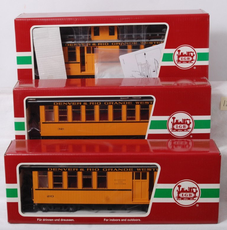 LGB 30805, 30815, 40755 D&RGW passengers in OB: Modern era LGB G scale 30805 321 coach, 30815 210 baggage and express, and 40755 baggage and express caboose, in original boxes, C8 due to light run time. Boxes show no wear.