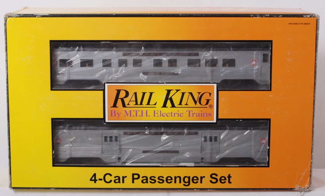 Railking Pennsylvania 4 car passenger set: MTH Railking modern O gauge 30-6715 Pennsylvania four car streamlined passenger set in OB. Cars are C8, set box has light wear.