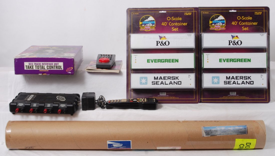 MTH DCS set, Cab-1 backdrop and more: Modern O gauge accessories from MTH and Lionel. Includes Lionel Cab-1 remote without box, two MTH 95064 container sets, MTH DCS remote and TIU with power pack, and 12 by 3 mountain backdrop from backd