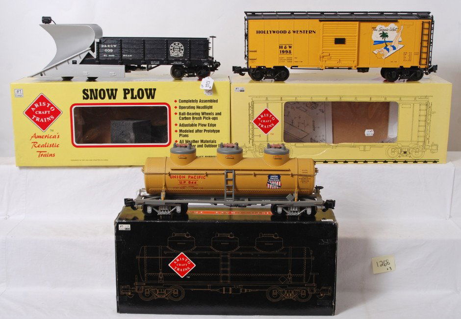 Three Aristo Craft G gauge freight cars in OB: Modern era Aristo Craft Trains G scale/Gauge 1 freight cars in original boxes, trains look C7-8. ART-46043 Hollywood & Western steel boxcar, ART-46701 Denver & Rio Grande Western snow plow, and ART-41