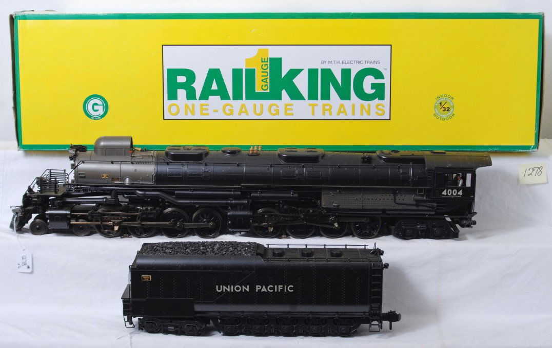 Rail King Gauge 1 U.P. 4-8-8-4 Big Boy in OB: Modern era Rail King G scale/Gauge 1 70-3009-1 Union Pacific Big Boy 4-8-8-4 steam locomotive and tender 4004 w/ProtoSound 2.0 in original box, C8 area. Box shows light wear and one small tear/punctur