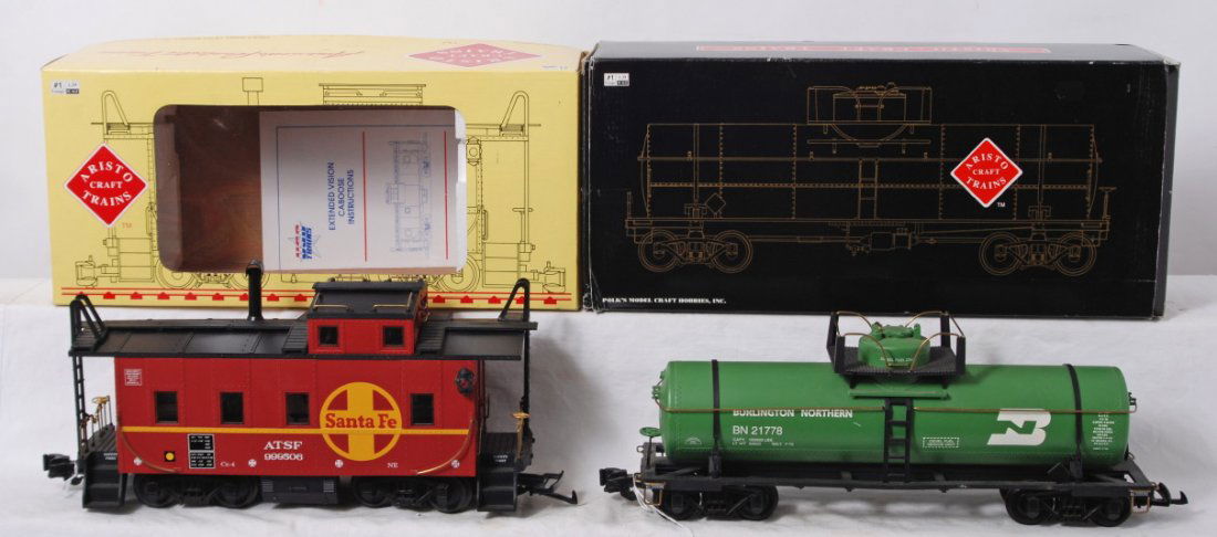 Aristo Craft ART-41305 BN tank, ART-42106 SF cabo: Modern era Aristo Craft Trains G scale/Gauge 1 ART-41305 Burlington Northern tank and ART-42106 Santa Fe caboose. Caboose has black tape on axles, glue repaired trim, touchups, C6-7. Tank car should c