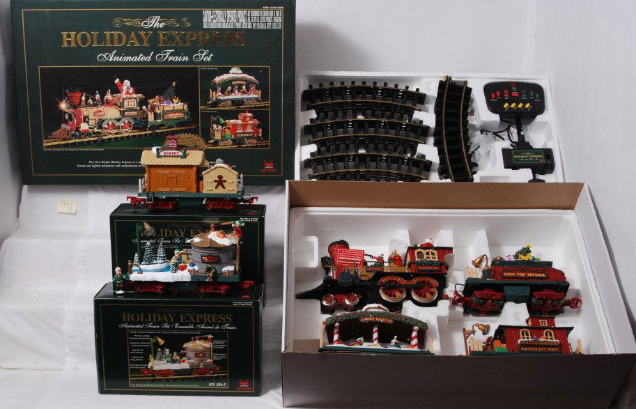 New Bright Holiday Express 384 plus two add on ca: Modern era New Bright G scale/Gauge 1 No. 384 The Holiday Express Animated Train Set with 384-2 water tanker skating car, and 384-3 bakery car, C7-8. Boxes show little wear.