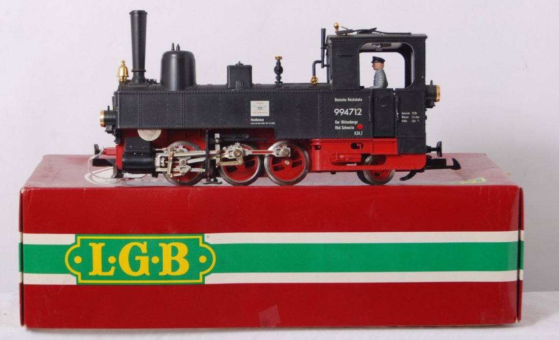 LGB 21701 steam locomotive in OB: Modern era LGB G scale/Gauge 1 21701 steam locomotive in original box, missing/broken trim C7. Box shows light wear.