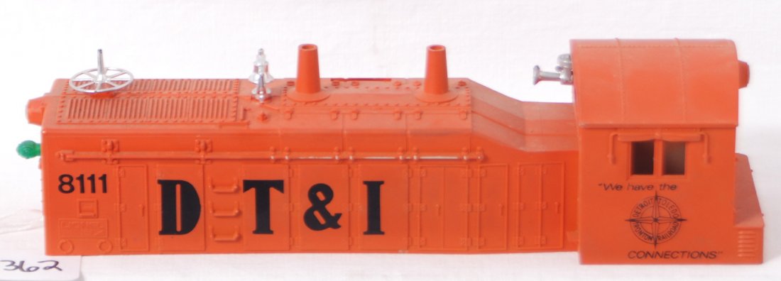 Lionel 8111 DT&I NW-2 diesel switcher shell: Modern era Lionel O gauge 8111 DT&I NW-2 diesel switcher shell with touchups and nick in cab roof, C6.