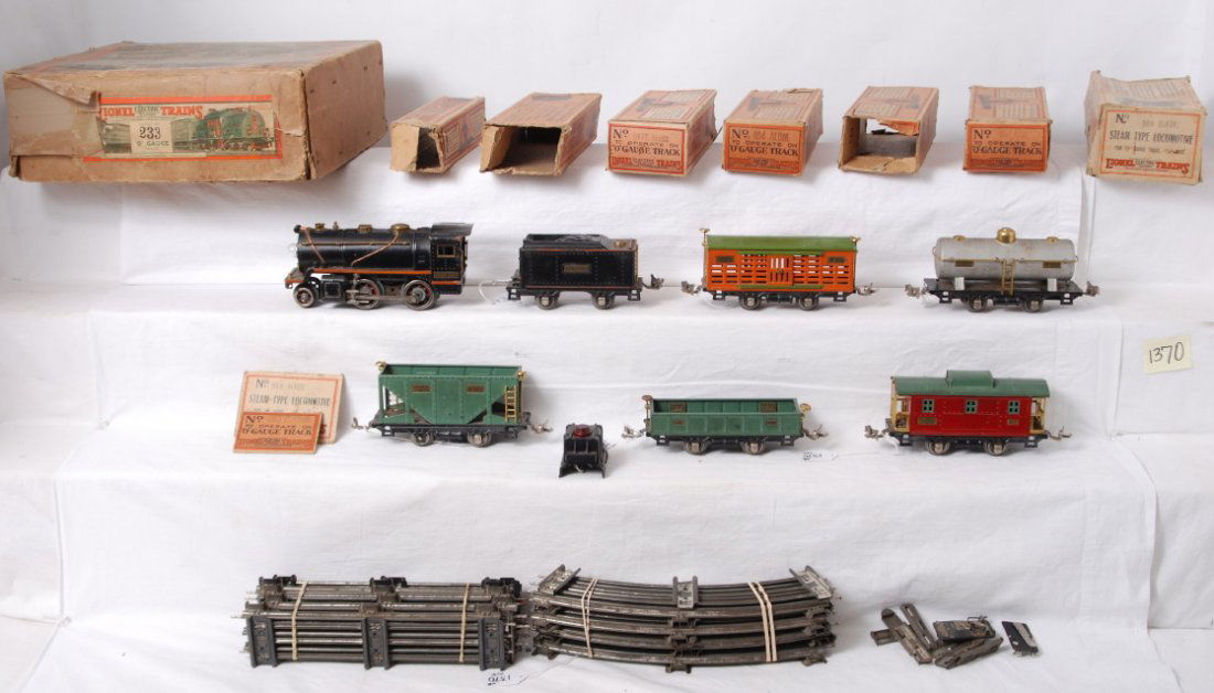 Lionel 233 O gauge freight set in OB: Prewar Lionel O gauge 233 steam freight set in original boxes. 258 steam loco, 257T tender, 902 gondola, 803 hopper, 804 tank, 806 stock car, and 807 caboose. 803 is missing a brake journal, otherwise