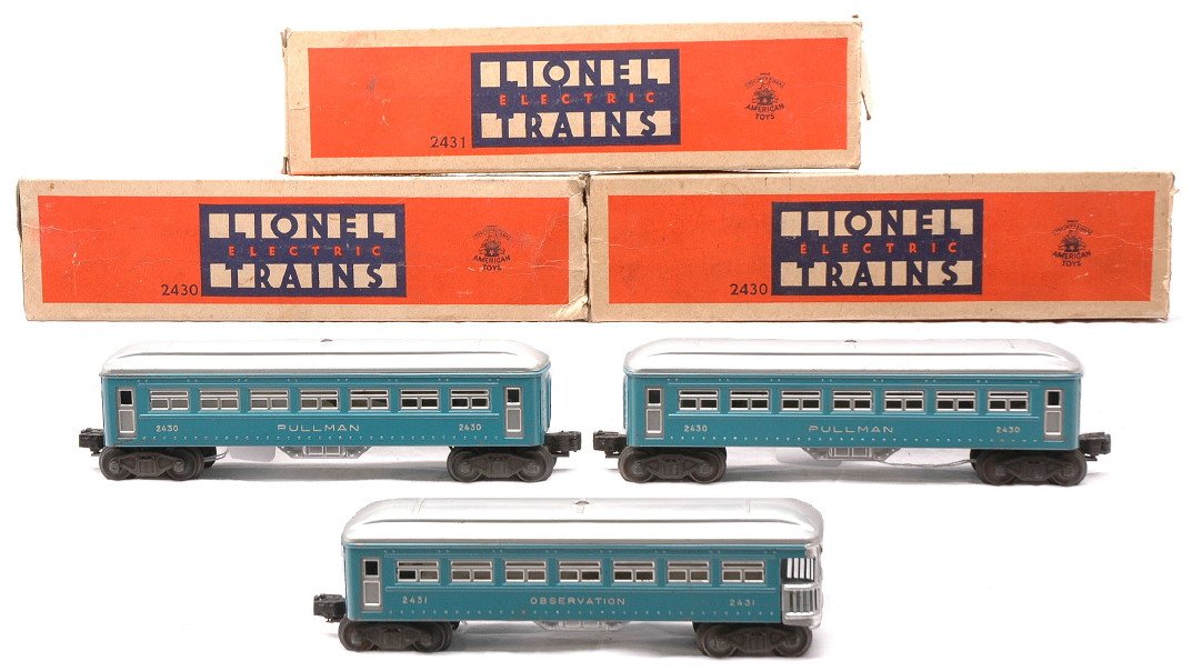 Lionel Blue/Silver Pass Cars 2430 2430 2431 OBs: Lionel postwar blue and silver passenger cars including; two 2430 Pullmans and a 2431 observation all in OBs. Some of the cars have incorrect trucks. The cars are C6. The OBs are missing flaps.