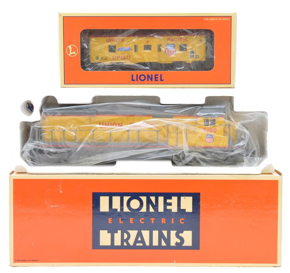 Lionel UP 18205 Dash-8 40C Loco 26502 Caboose: Lionel 18205 Union Pacific Dash-8 40C diesel loco and a 26502 Union Pacific bay window caboose numbered 6517 both in OBs, C8.