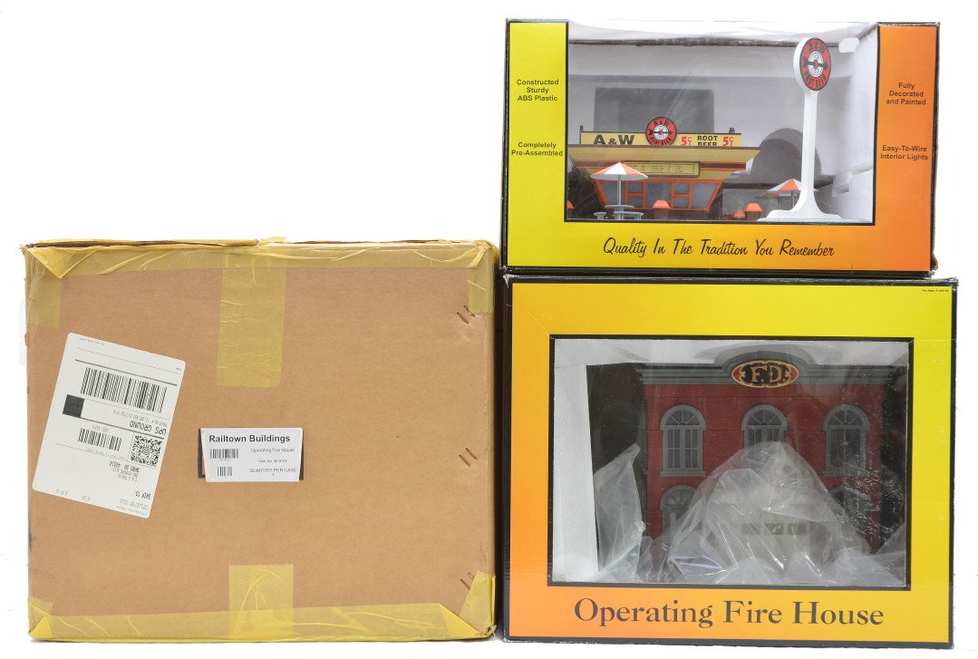 RK MTH 30-9102 Fire House 30-9068 A&W OBs: Rail King by MTH 30-9102 operating fire house in OB with outer shipping carton and a 30-9068 A&W Root Beer Fast Food Restaurant Stand in OB. The A&W Restaurant has specks of brown paint on it and is C